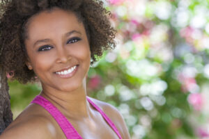 Happy African American Woman Smiling Outside