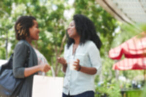 two friends talking together