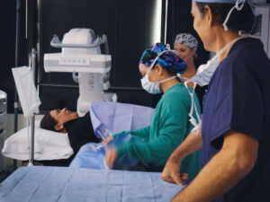 Dr. Carlson and team prepping a patient for treatment.