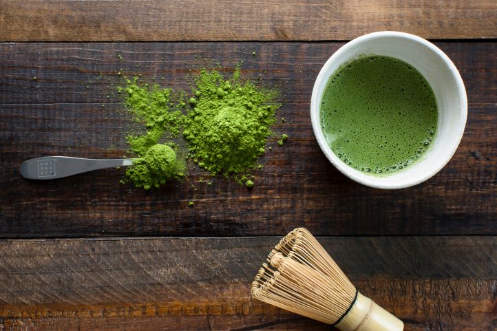 green tea on wooden table