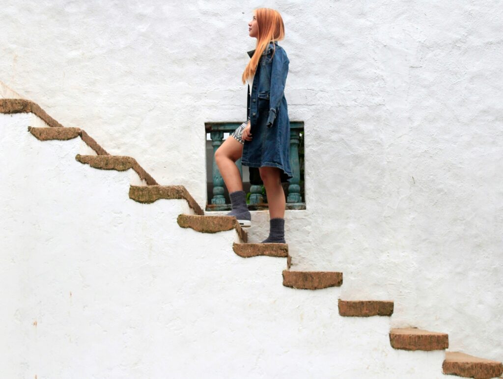 woman climbing stairs

