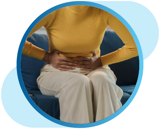 Woman holding abdomen in pain