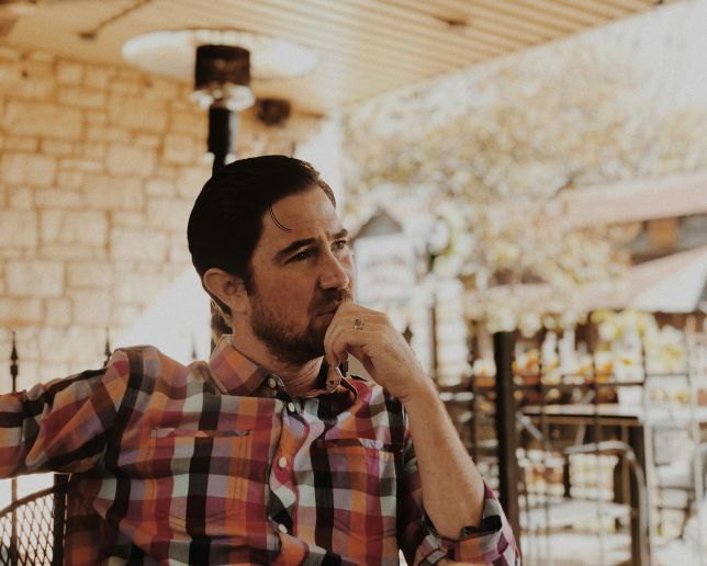 man sitting and thinking