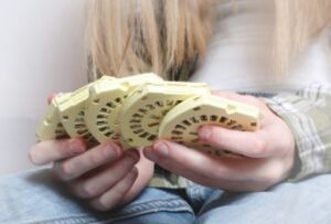 woman holding birth control pills